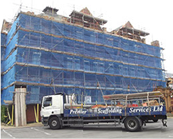 Hawkeys Building, covered in blue scaffolding material.
